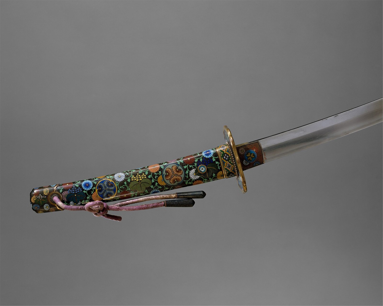 Top 10 Coolest Swords Legendary Blades from History and Pop Culture 2 Authentic traditional Japanese Katana blade and mounting showing the distinct hamon temper line